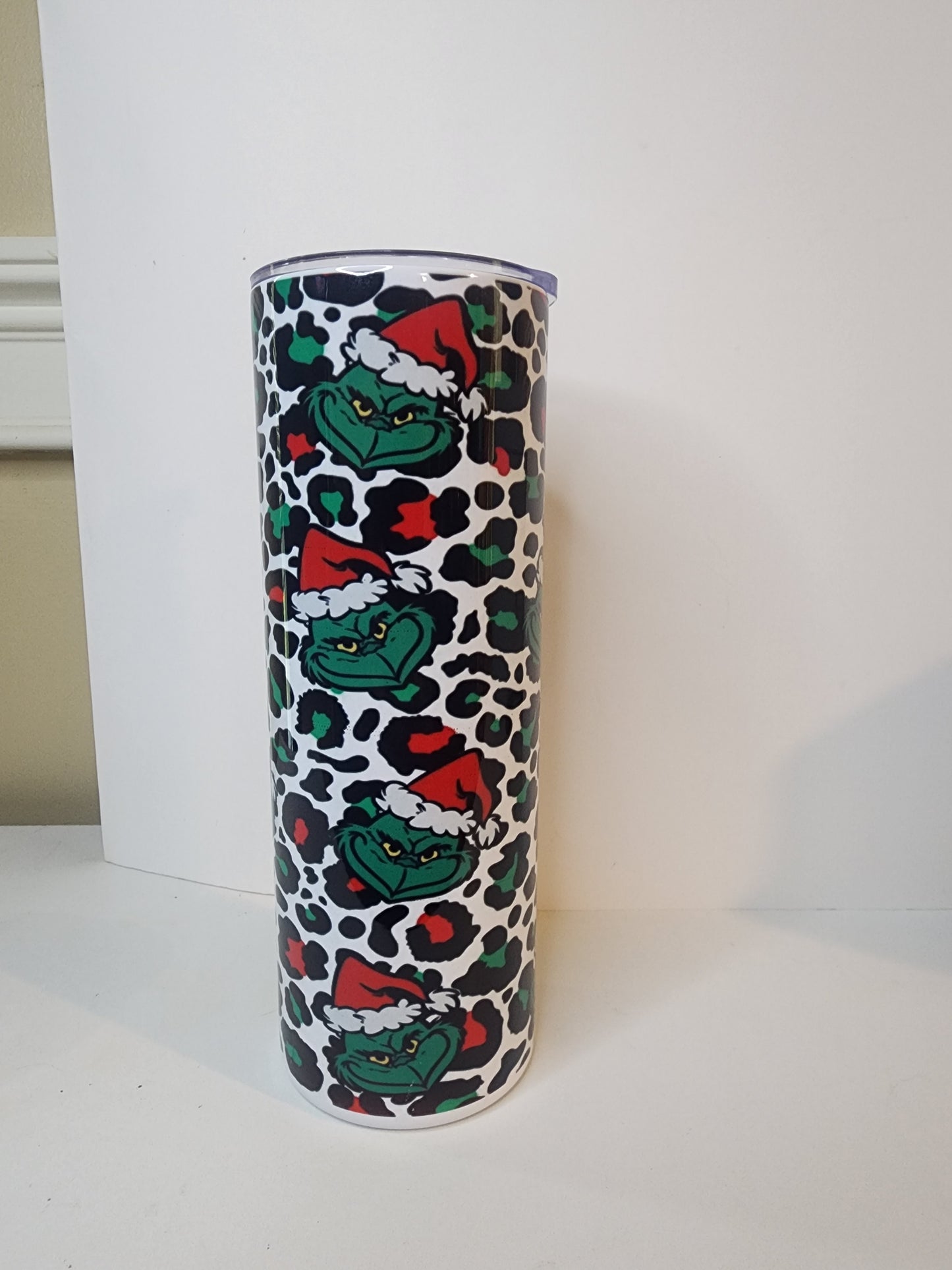 Animal print and Santa Grinch Skinny Tumbler